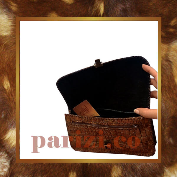 Women's leather handbag and hand-stitched